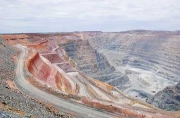 An image depicting a Gendio weighbridge in a mining setting, highlighting its durability and precision in handling heavy loads and mining materials.